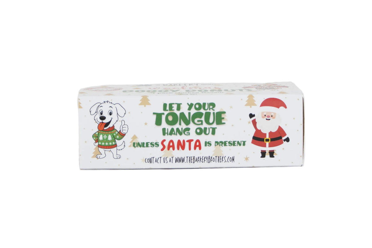 A rectangular white product box with Christmas-themed illustrations, including a dog in a green sweater and Santa Claus, with the text 'LET YOUR TONGUE HANG OUT UNLESS SANTA IS PRESENT' on a white background.