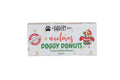 A rectangular box of 'woofmas DOGGY DONUTS' dog treats by 'The Barkery Brothers' on a plain white background.